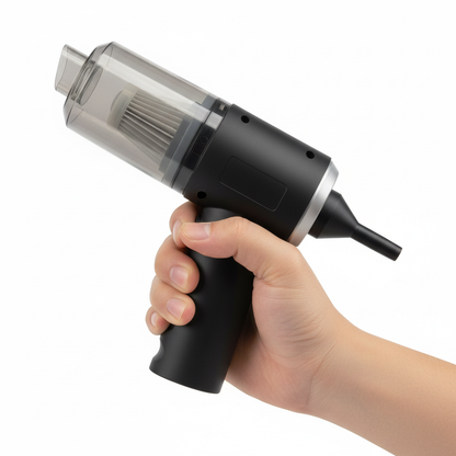 Hand holding vacuum to show scale