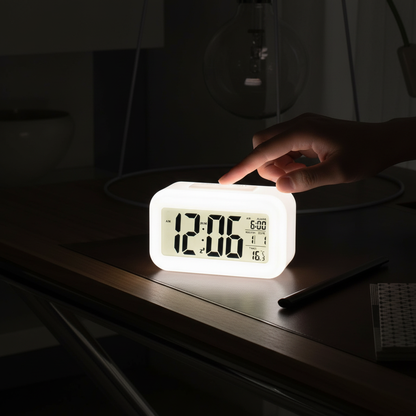 Hand pressing snooze with backlight